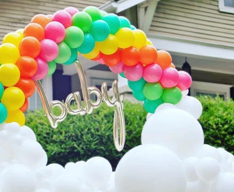 Rainbow Balloon Arch with saying and clouds